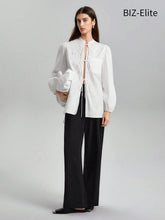 BIZwear Women's Solid Color Lantern Sleeve Lace-up Shirt